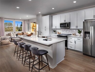 Photo is not of the actual home, but is an inspirational photo of builder’s model home and may depict options, furnishings, and/or decorator features that are not included