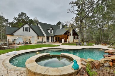 Single solid Door on back of house enters into garage and the single French Door leads in the MUD/Laundry area. In between the 2 doors is an outdoor shower to rinse off!


