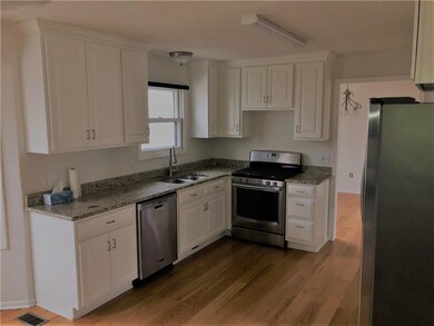 White Cabinets, Granite Tops, Stainless Appliances