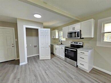 Kitchen featuring appliances with stainless steel 