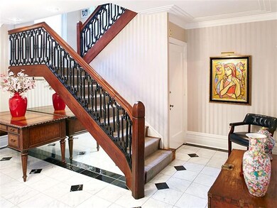 Stunning Foyer with classic white and black marble