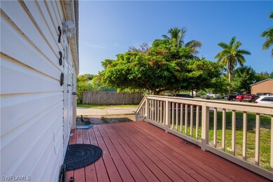 Wooden terrace with a lawn