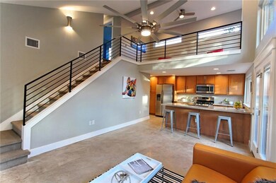 Living area featuring recessed lighting, baseboar