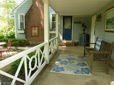 Welcoming Covered Side Porch Entry ....