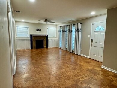Unfurnished living room with a wealth of natural l