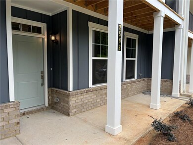 Large Covered Front Porch. 2 Large Rocking Chairs would fit perfectly or the furnishings of your choice! Relax and Unwind.