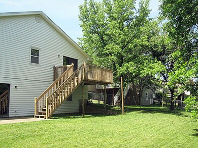 another view of deck and yard