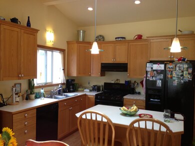 Kitchen with vaulted ceilings