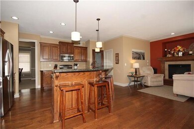 Large kitchen joining hearth room.