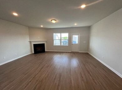 Hardwood flooring is included throughout the main living areas. In your great room, we have also included a wood-burning fireplace and LED lighting.