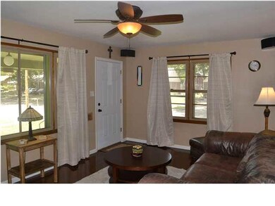 Living room with loads of natural light and Hardwo