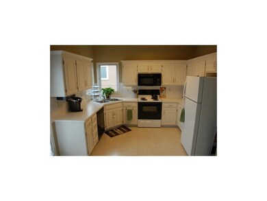 Plenty of counter space and corner window.