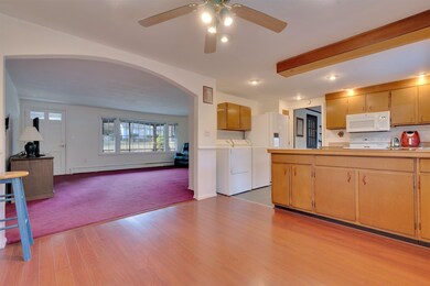 Living room is off the dining room