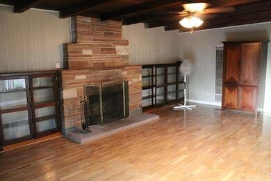 Den with fireplace
