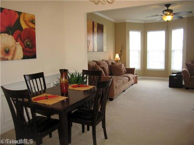 Dining Room. The open floor plan from the dining room to the living room offers plenty of creative space and room to entertain!  The dining room features wainscoting for a more formal feel.