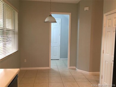 Breakfast nook with room for a large table.  Behin