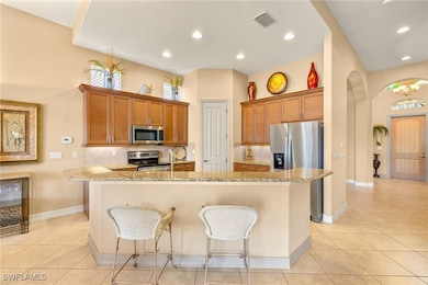 Kitchen featuring appliances with stainless steel