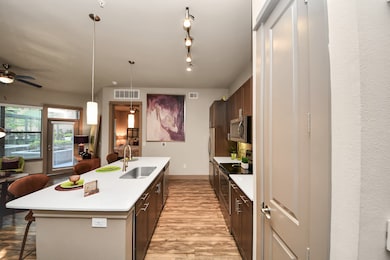 Photos are not of actual units, similar floor plan finishes, verify dimensions