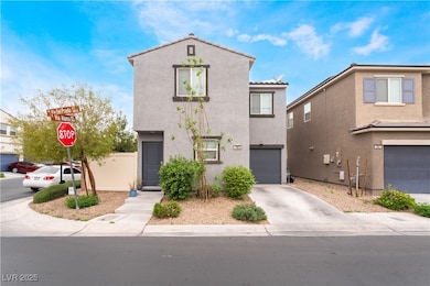 View of front facade featuring driveway, a garage,