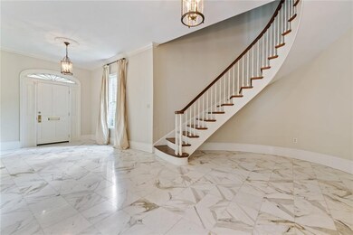 Impressive foyer with gorgeous marble floor