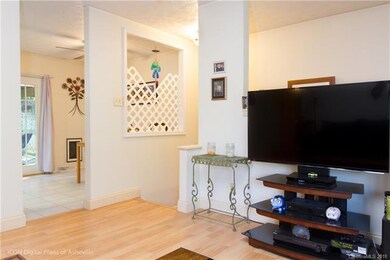 Living room opens up to kitchen