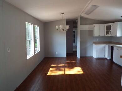 A view of the breakfast/kitchen area! Love the natural light in this room.