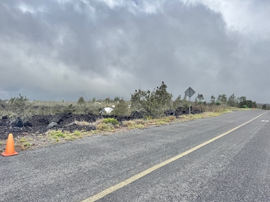 Lot 24 Block 111 Bamboo Lane is the fourth 122' x 356' lot on the makai side past Mahimahi Drive.