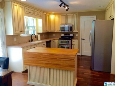With granite countertops, stainless appliances, lo