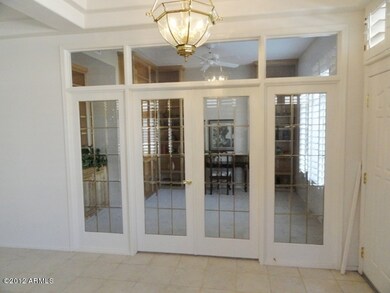Library den glass doors from entry