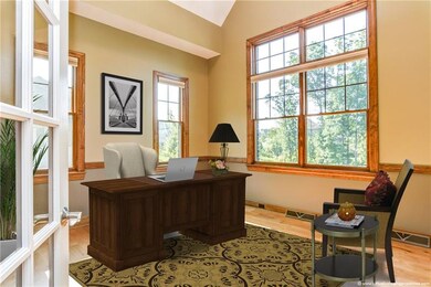 Separated from the welcoming entry via french door
