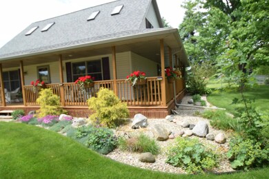 The home is beautifully landscaped.  The established gardens and wrap around porch give a warm welcome to all who come to visit.