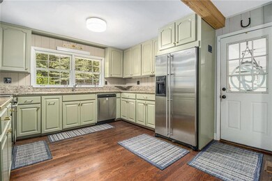 Updated stainless steel/black appliances.