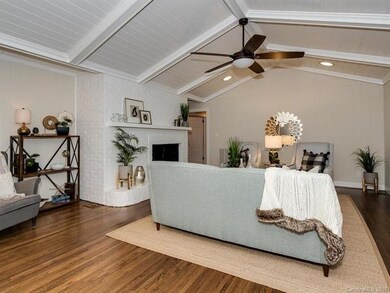 Large fireplace/hearth and cozy reading nook make 