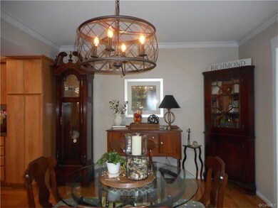 Dining room with new crown molding and hardwood fl