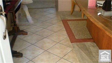 Beautiful Tile Entry Way with Living Room off to t