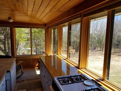 Kitchen w/eating area toward water.