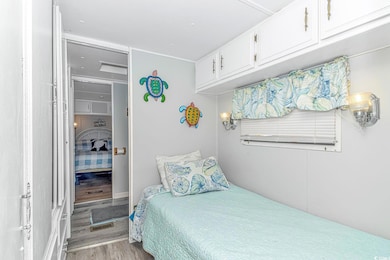 Bedroom with light wood-type flooring