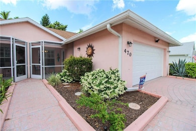 View of property exterior featuring a garage