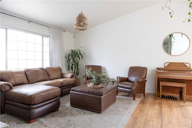Living room featuring light wood finished floors