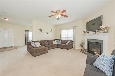 Open Great Room with a cozy gas fireplace.