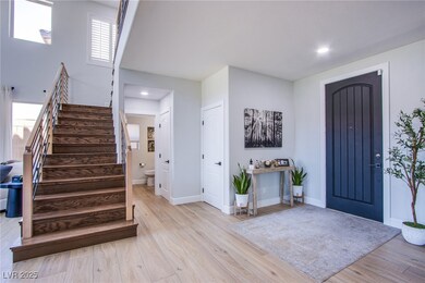 Entryway with stairway, light wood-type flooring,