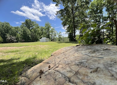 318 Duck Pond Lane - Sitting stone with