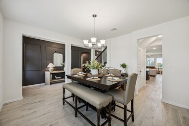 This dining room is the perfect place to host dinn