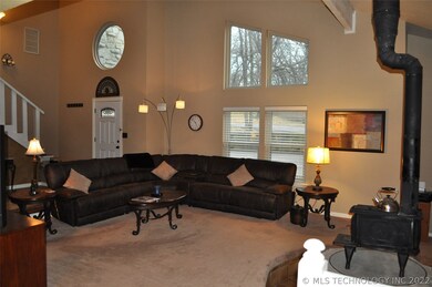 Located off the front entry is the large family ro