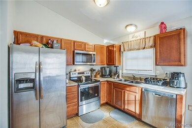 Kitchen with stainless steel applicances.