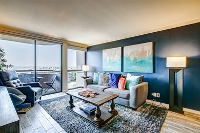 Another view of the living room which offers crown