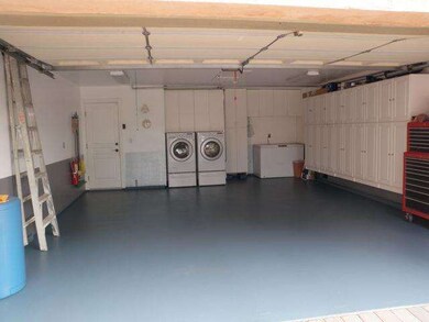 finished 2 car garage with hard-surface coating