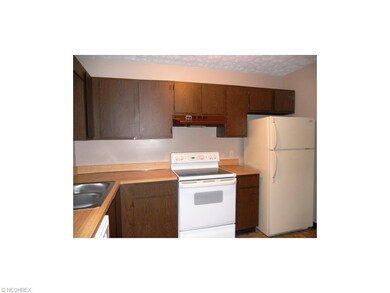 Kitchen with newer appliances and ample cupboard s