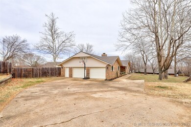 Oversized 2-Car Attached Garage & Extra Concrete D