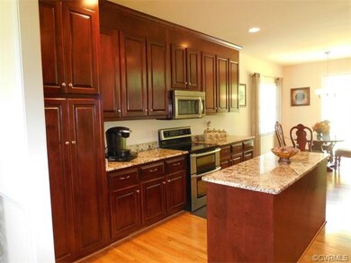Handsome solid wood cabinetry with crown molding  